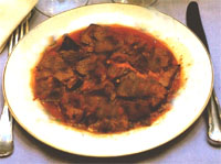 Asadura de cordero en ajillo