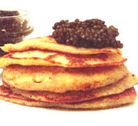 Blinis con caviar