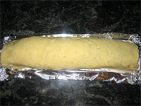 Brazo de puré de patatas relleno de carne picada