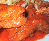 Costillas de cerdo en salsa roja 