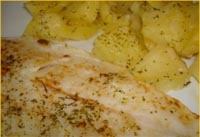 Filetes de panga al horno con hortalizas y cava