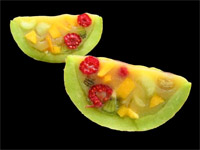 Gajos de melón con macedonia de frutas