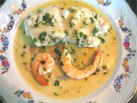 Rape y langostinos en salsa verde