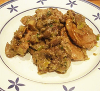 Rodajas de cerdo con crema de setas y gorgonzola